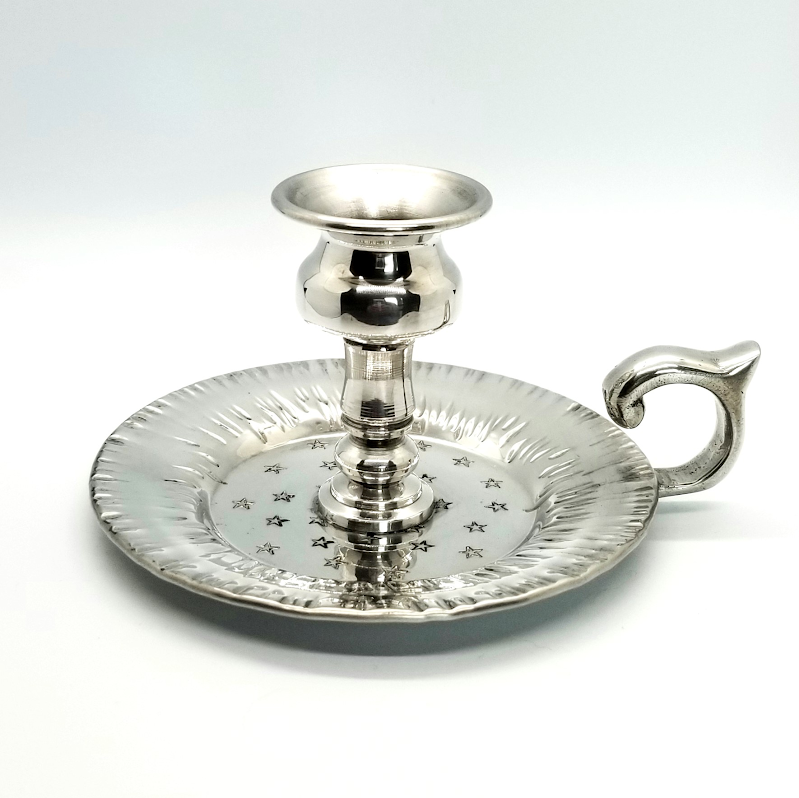 Candlestick with Stars and Sunbursts
