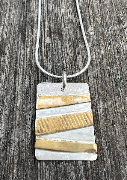 Sterling Silver and brass pendant on Sterling Silver chain