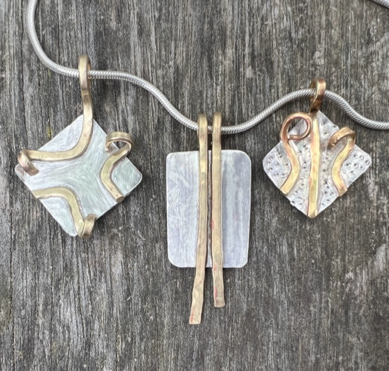 Sterling Silver and brass pendants on Sterling Silver chain